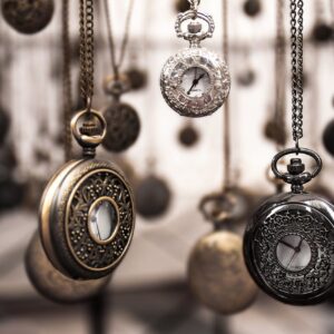 Assorted Silver-colored Pocket Watch Lot Selective Focus Photo