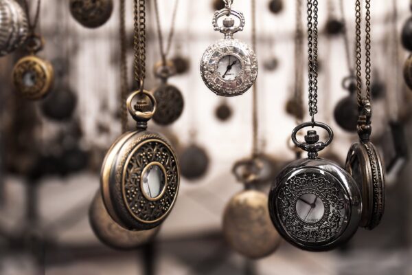 Assorted Silver-colored Pocket Watch Lot Selective Focus Photo